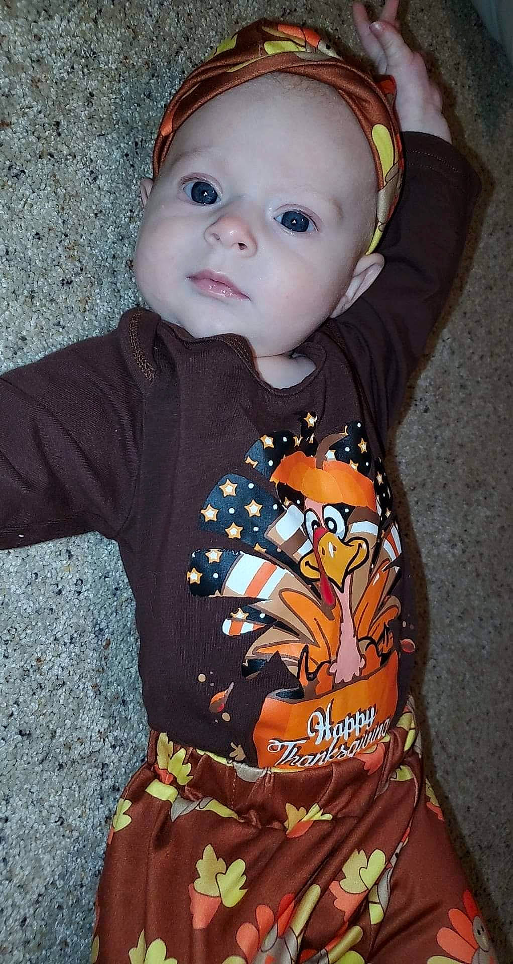 Kara is registered to the contest to win money with this photo: baby, baby_products, baby_toddler_clothing, cheek, child, child_model, cool, eyelash, hair_accessory, headband, long_sleeved_t_shirt, person, portrait_photography, sleeve, toddler