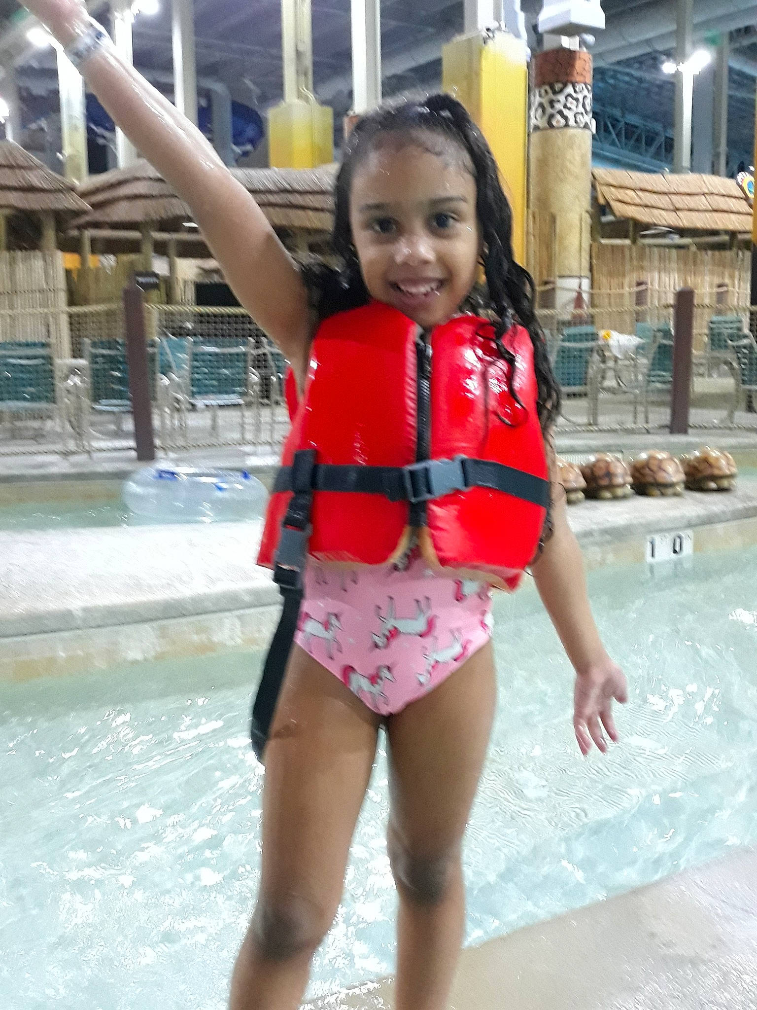 Gianni is registered to the contest to win money with this photo: clothing, fun, joy, leisure, lifejacket, person, recreation, swimming_pool, swimwear, vacation, water_park