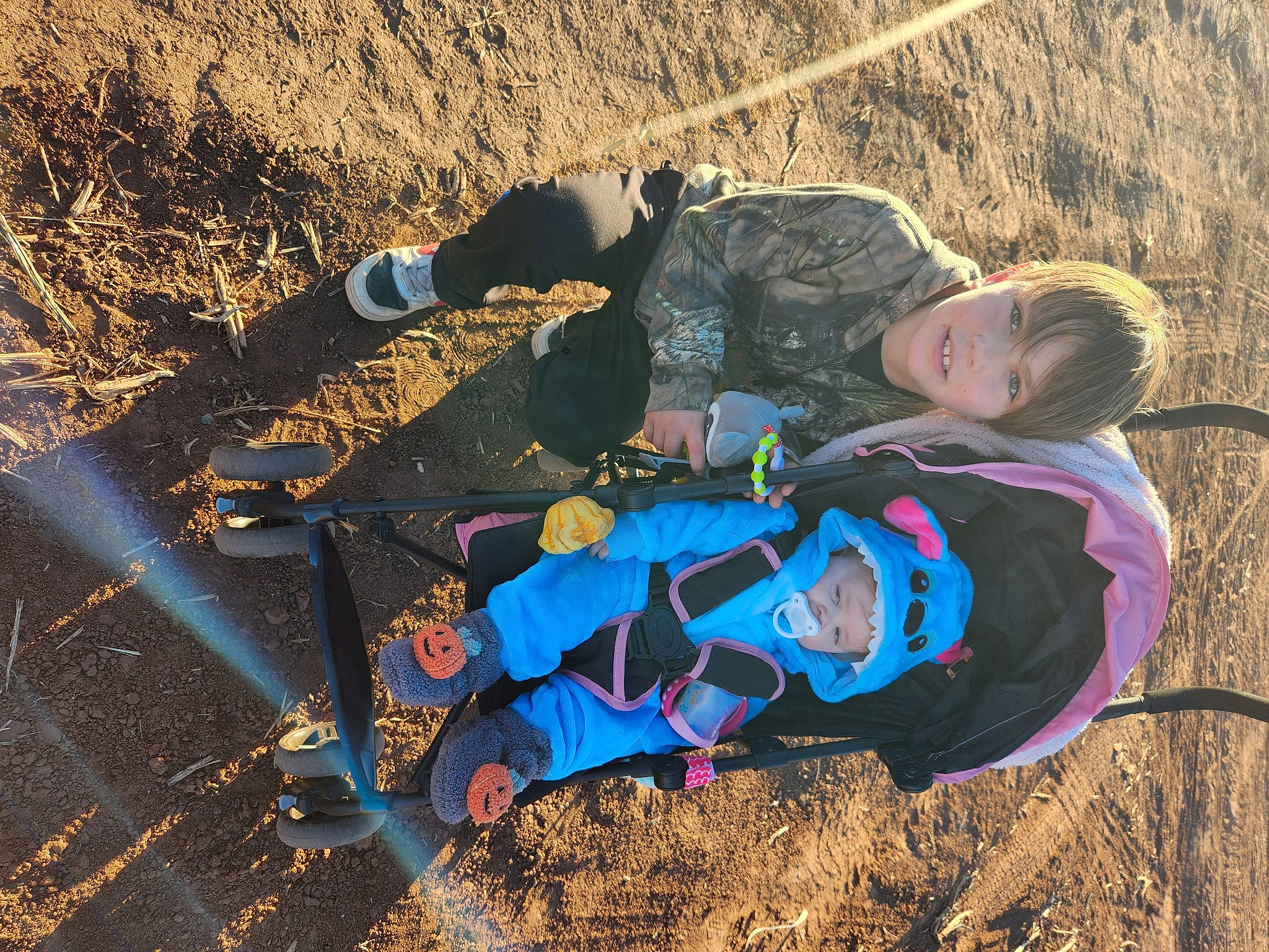 Braydon is registered to the contest to win money with this photo: adventure, boot, electric_blue, fun, geology, grass, grassland, headwear, landscape, leaf, leisure, natural_environment, people_in_nature, person, personal_protective_equipment, recreation, shadow, slope, sneakers, soil