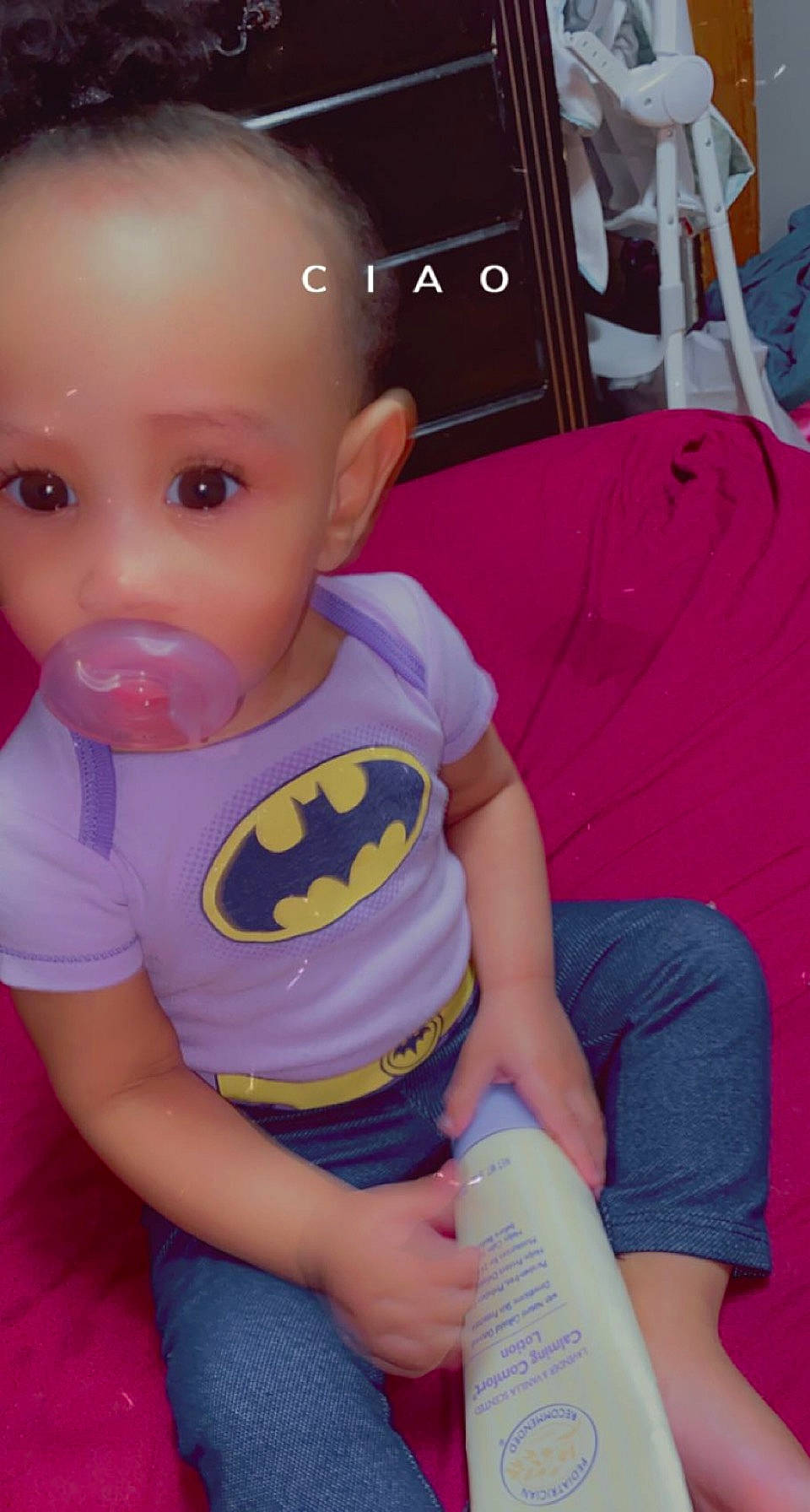 Nahla is registered to the contest to win money with this photo: baby_toddler_clothing, cheek, cool, eyelash, facial_expression, finger, fun, hairstyle, happy, joint, mouth, nose, person, pink, purple, skin, sleeve, t_shirt, thigh, toddler