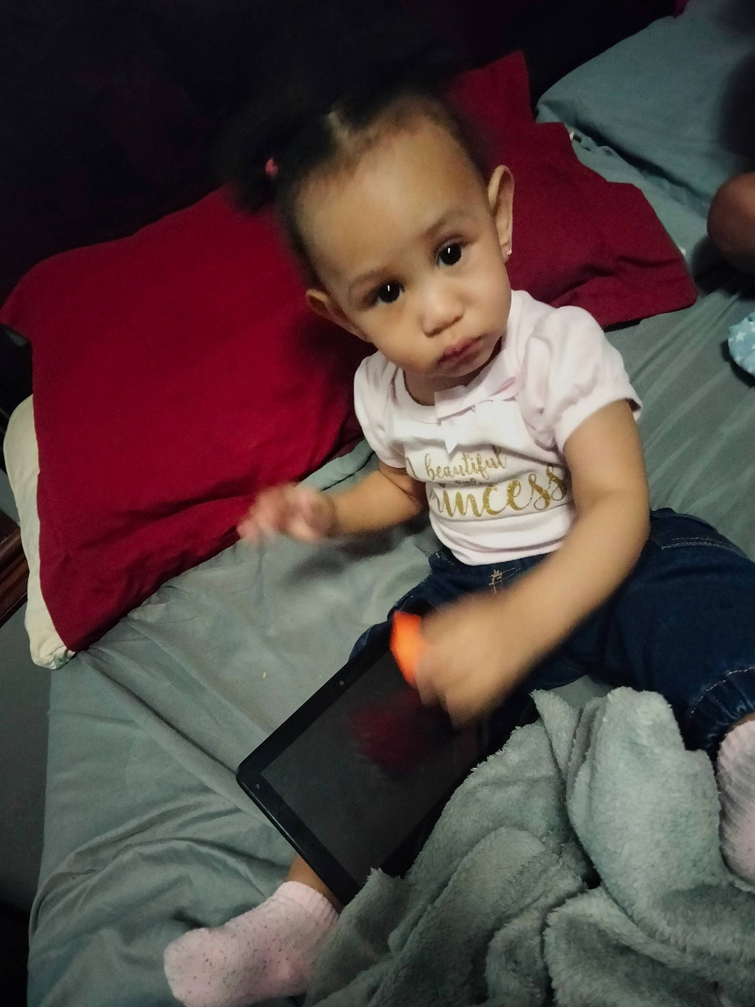 Nahla is registered to the contest to win money with this photo: baby_toddler_clothing, cheek, comfort, cool, electronic_device, facial_expression, finger, fun, hairstyle, hand, happy, lap, leg, mouth, muscle, person, skin, smile, standing, thigh