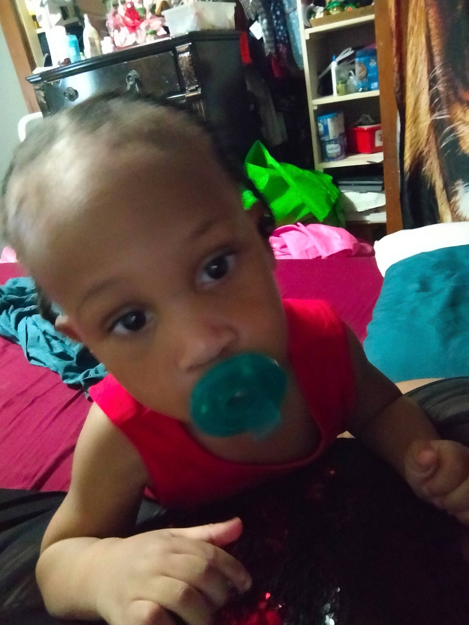 Micah is registered to the contest to win money with this photo: baby, baby_products, bookcase, cheek, child, cool, ear, eye, fun, happy, human_body, mouth, person, play, room, shelf, sitting, sky, snapshot, t_shirt