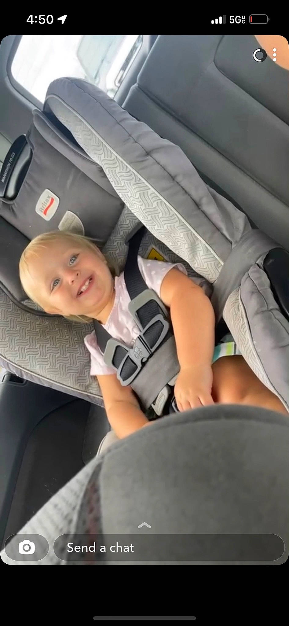 Dakoda is registered to the contest to win money with this photo: auto_part, automotive_design, automotive_exterior, automotive_wheel_system, baby, baby_products, car_seat, car_seat_cover, child, comfort, family_car, head_restraint, human_leg, joy, luxury_vehicle, motor_vehicle, person, personal_luxury_car, smile, thigh