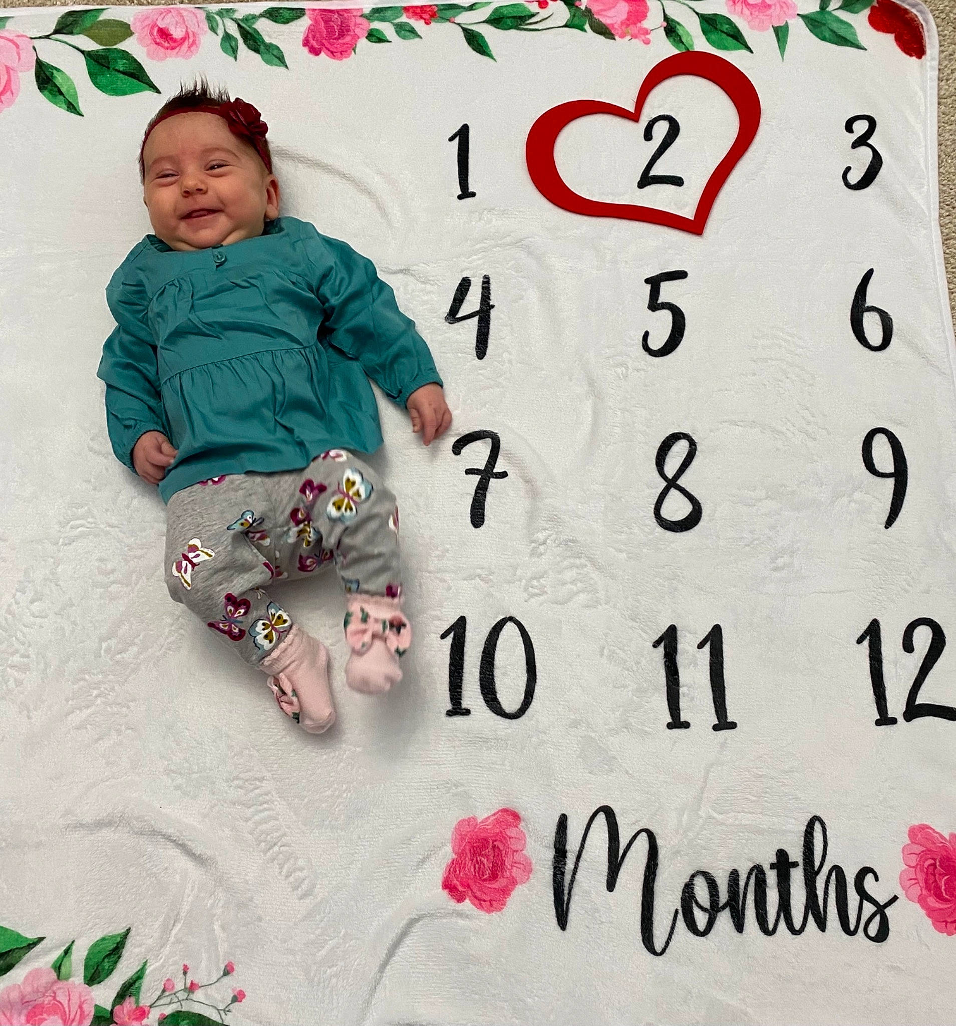 Kynslee joined the competition — help win amazing prizes! baby_toddler_clothing, child, comfort, design, facial_expression, font, happy, headwear, heart, joy, linens, magenta, pattern, person, pink, product, rectangle, red, sleeve, smile