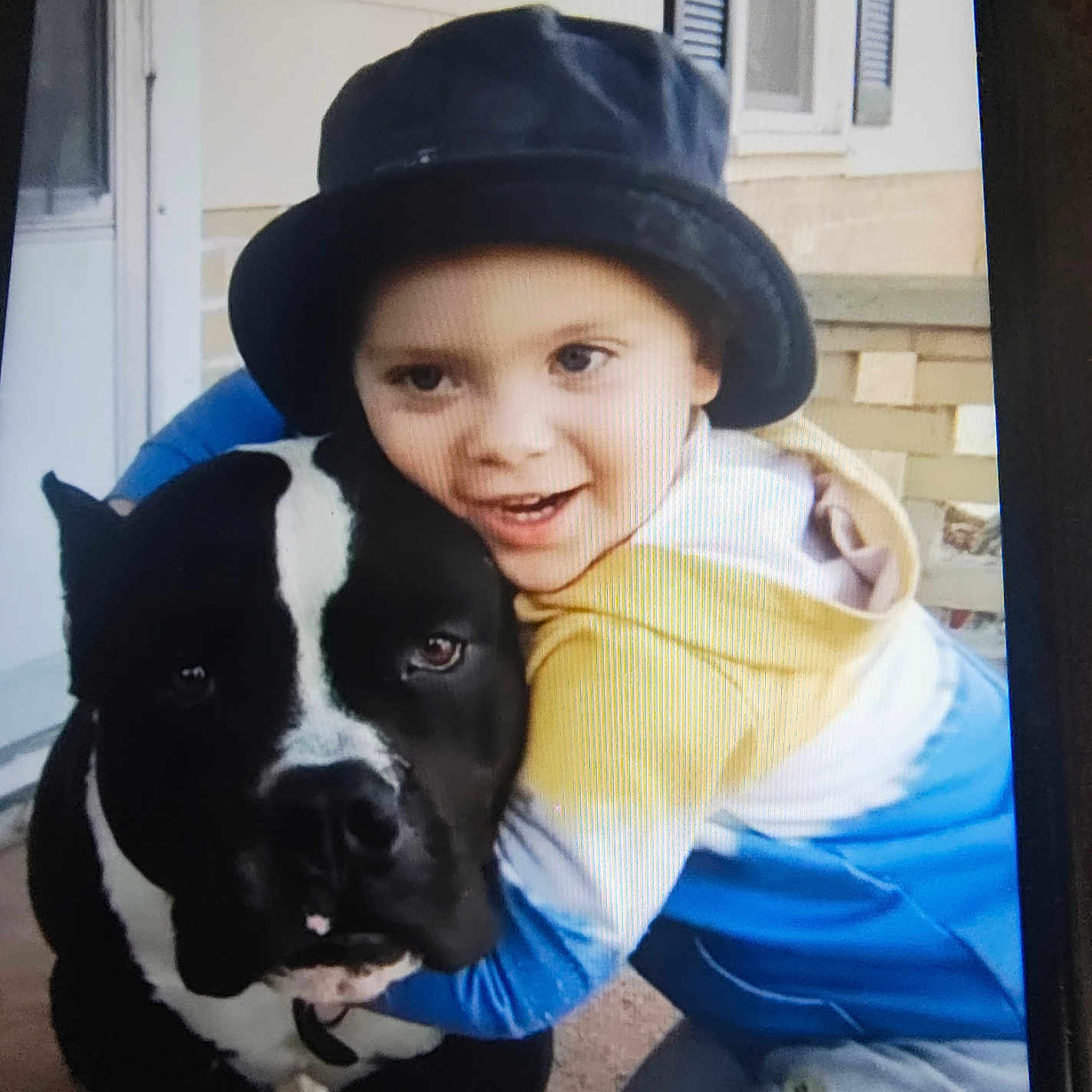 Preacher C Igou joined the competition — help win amazing prizes! animal, baby, baseballcap, bulldog, canine, cap, clothing, coat, costume, dog, face, hat, head, hound, jacket, person, pet, photography, portrait, puppy