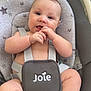 baby, infant, blue_eyes, plush_toys, baby_seat, gray, straps, cute, chubby, hands, feet, smiling, indoors, comfort, playful, child, seat, face, portrait, young