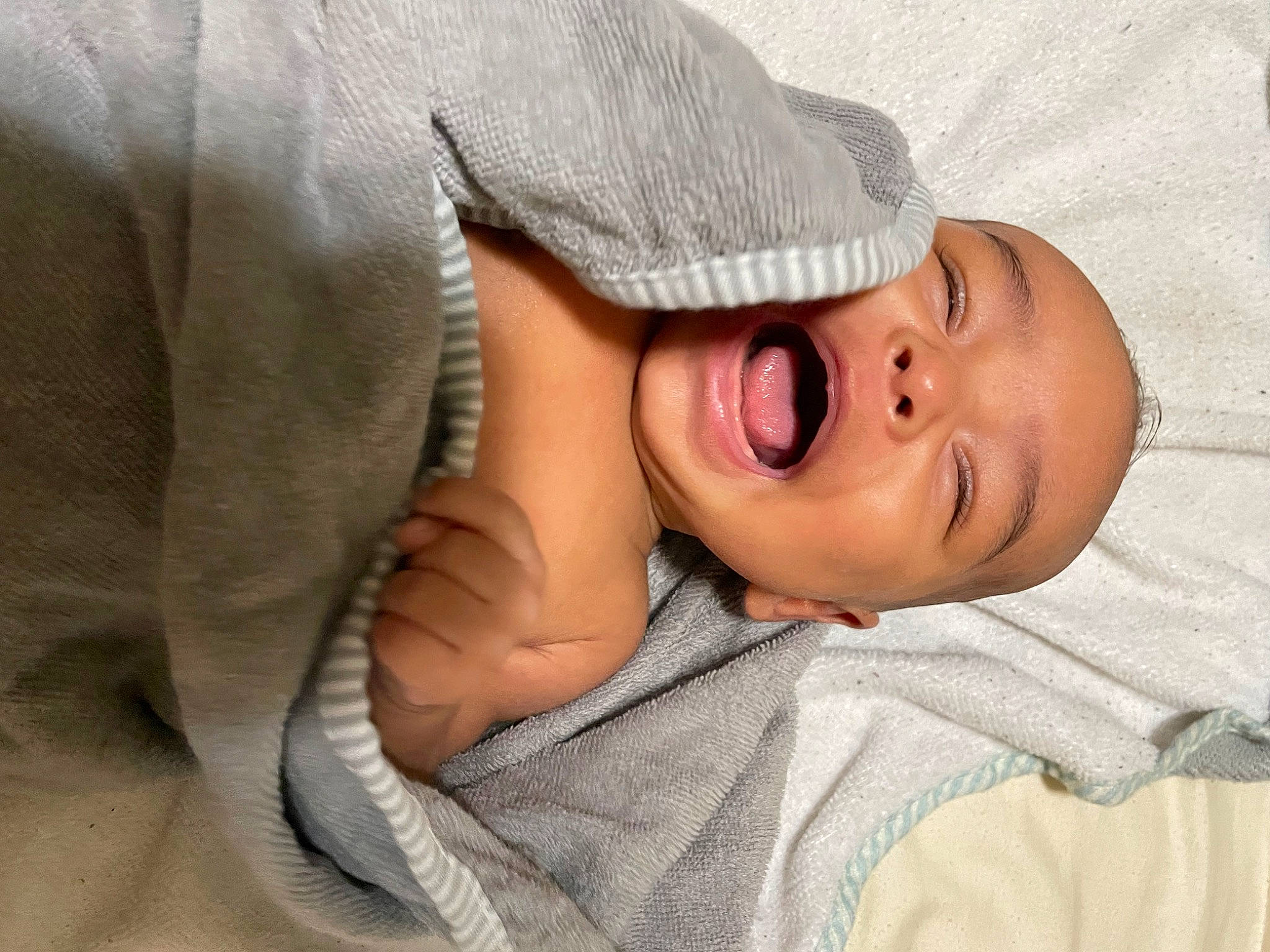 Rich is registered to the contest to win money with this photo: baby, baby_products, baby_sleeping, baby_toddler_clothing, bedtime, cheek, child, comfort, headgear, linens, lip, nose, person, portrait_photography, skin, sleep, sleeve, smile, textile, toddler