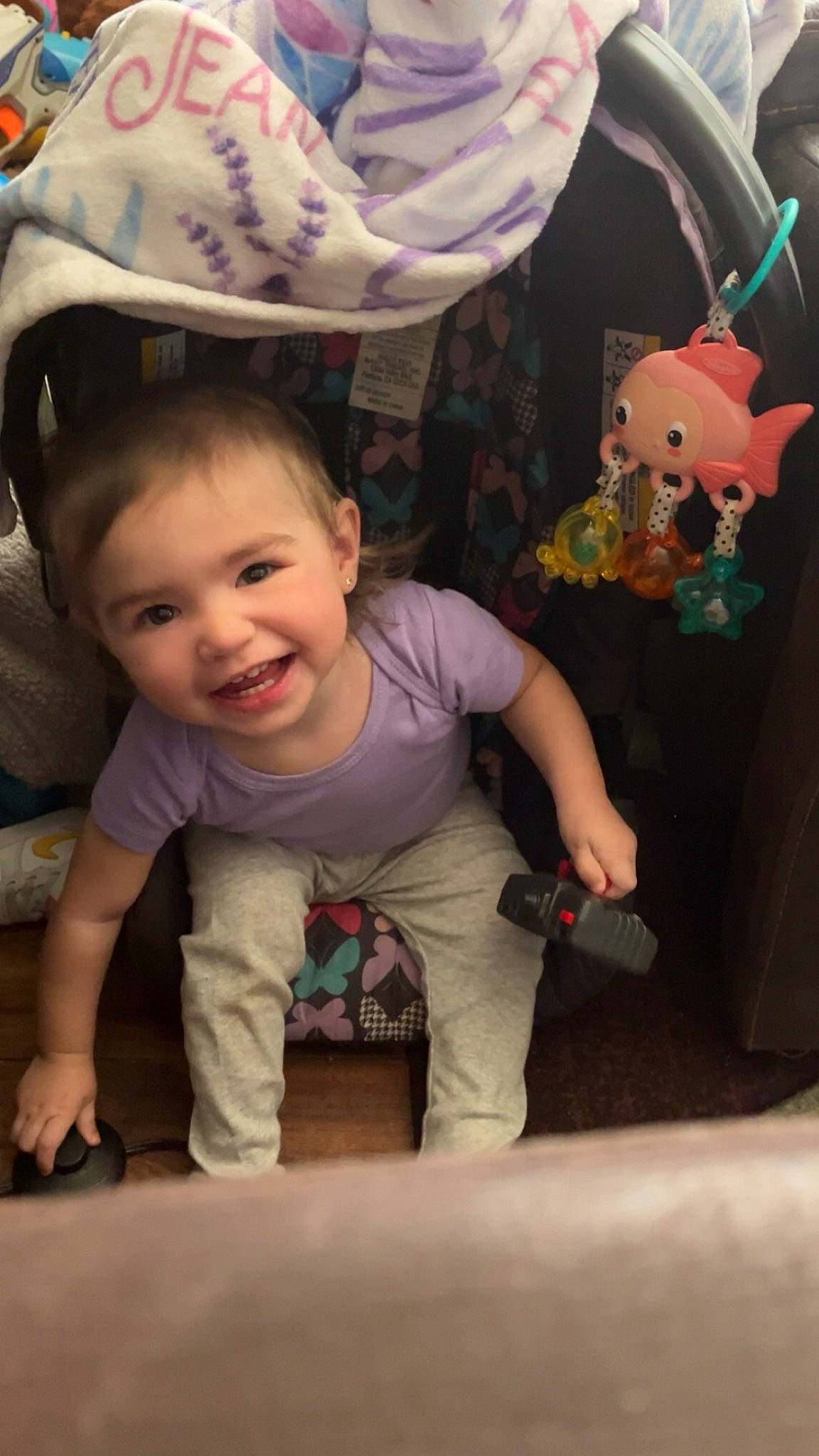 Malaun joined the competition — help win amazing prizes! baby, baby_toddler_clothing, cheek, child, cool, flooring, fun, happy, human_body, joy, mouth, person, pink, room, sitting, skin, sleeve, smile, t_shirt, toddler