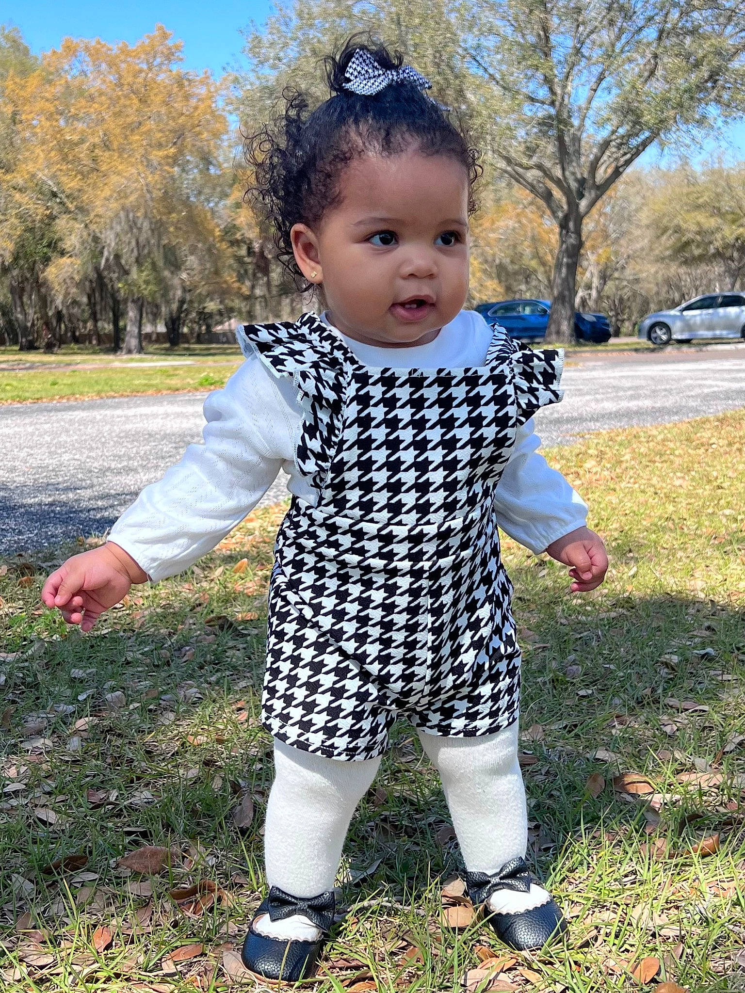 Meghan joined the competition — help win amazing prizes! baby, baby_toddler_clothing, child, eye, face, fun, grass, grass_family, happy, head, lawn, pattern, people_in_nature, person, plant, sitting, sky, sleeve, spring, toddler