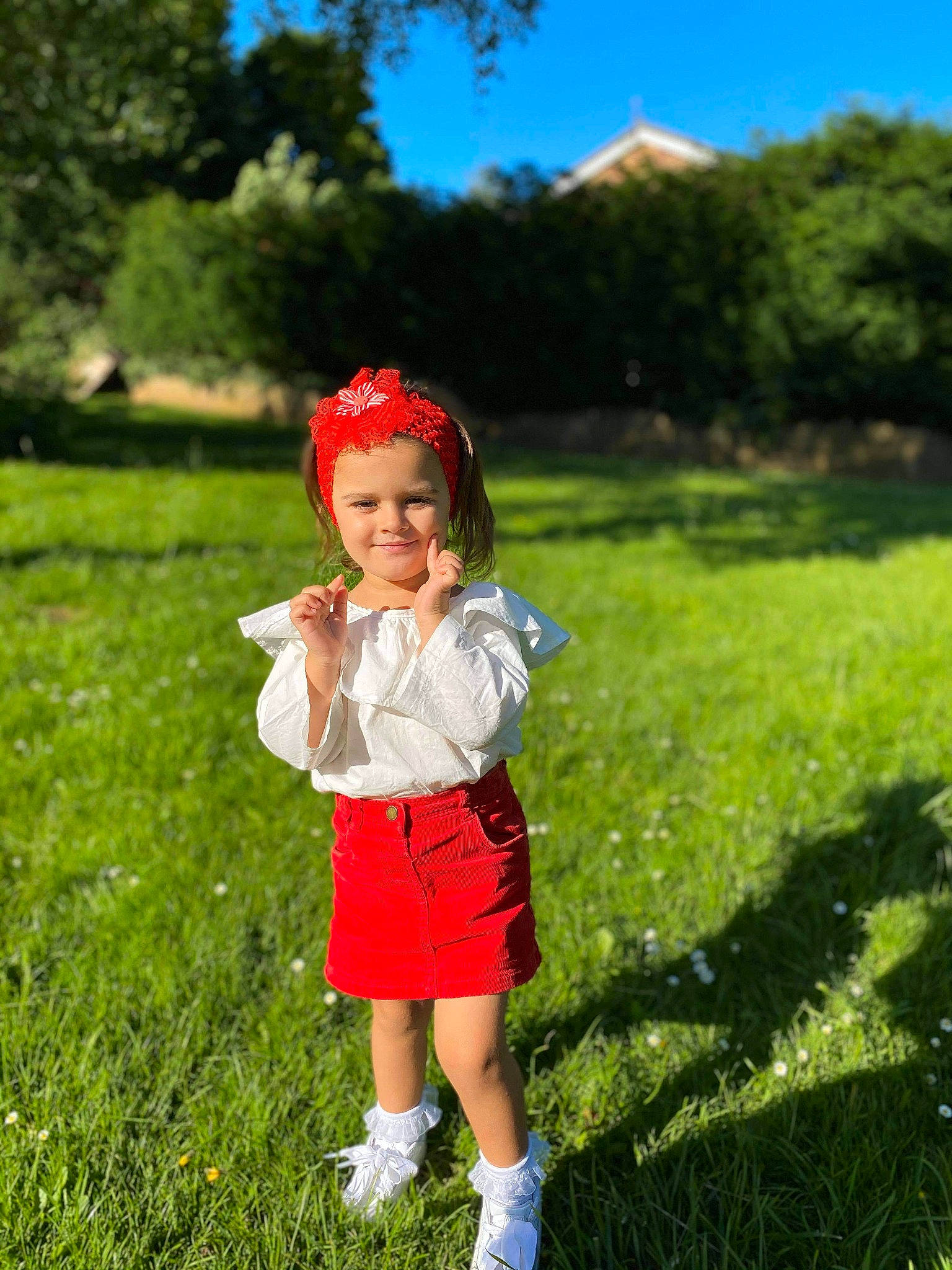 Darla is registered to the contest to win money with this photo: child, fun, grass, grass_family, grassland, happy, headgear, headwear, joy, lawn, leisure, meadow, person, photography, plant, play, recreation, red, smile, summer