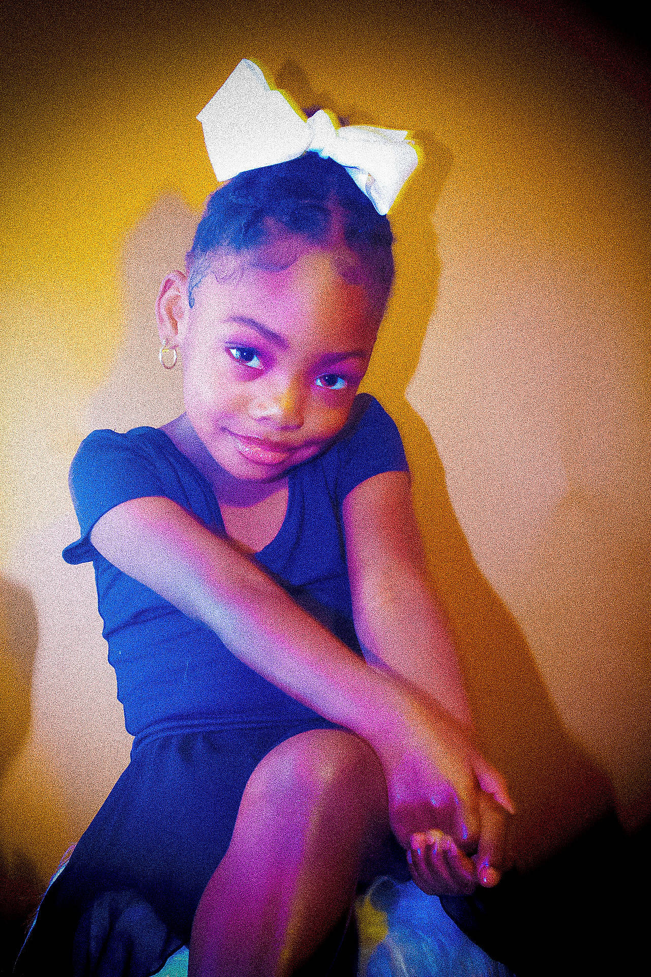 Kaitlin is registered to the contest to win money with this photo: baby_toddler_clothing, child, electric_blue, fashion_design, flash_photography, fun, happy, human_leg, joy, knee, magenta, pattern, person, pink, portrait_photography, purple, sitting, smile, t_shirt, thigh