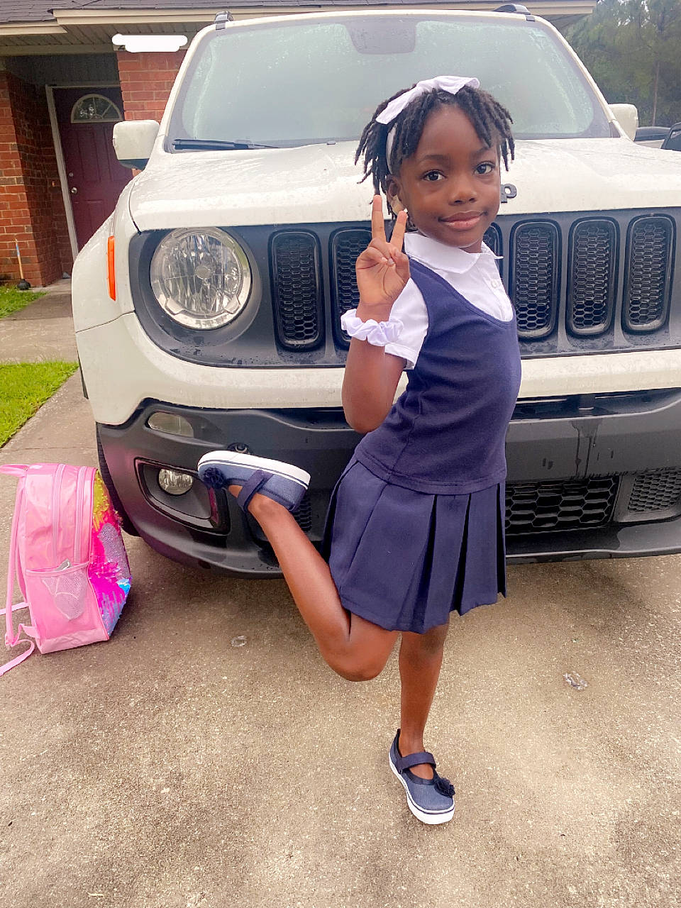 Kaitlin is registered to the contest to win money with this photo: alloy_wheel, automotive_design, automotive_exterior, automotive_lighting, automotive_tire, bumper, car, grille, headlamp, hood, joy, land_vehicle, leg, light, motor_vehicle, person, personal_luxury_car, rim, shoe, vehicle