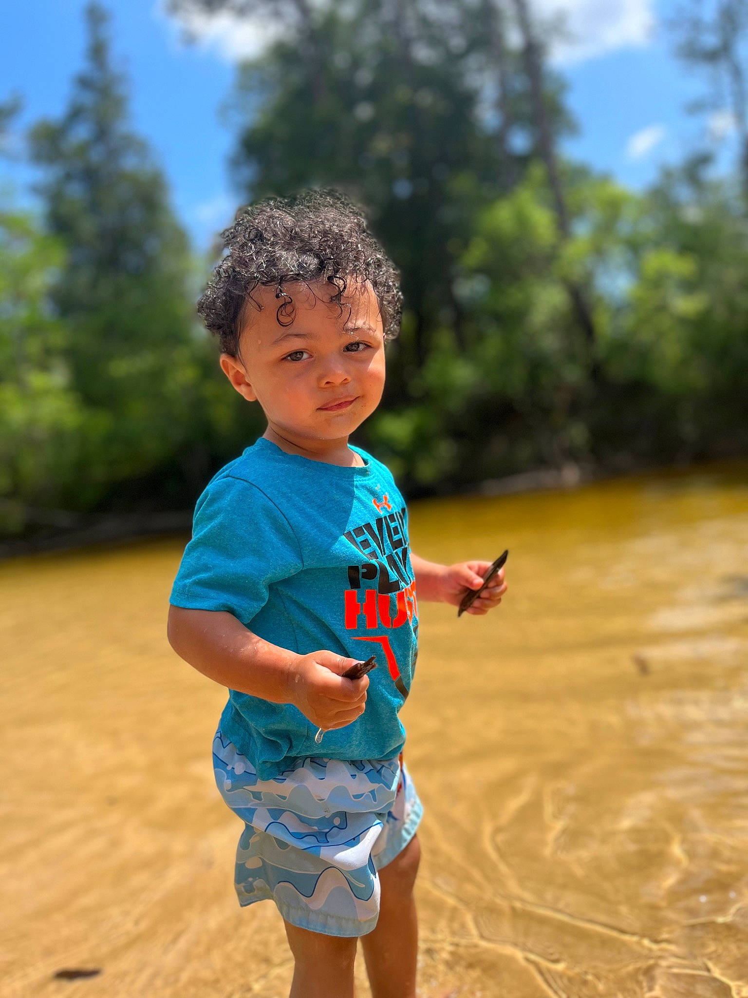 Kyree is registered to the contest to win money with this photo: baby_toddler_clothing, child, fun, grass, happy, landscape, leisure, people_in_nature, person, recreation, sand, shorts, skin, sky, sleeve, summer, t_shirt, toddler, travel, tree