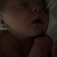 Tyler Braden is registered to the contest to win money with this photo: baby, sleeping, infant, closeup, blanket, peaceful, newborn, face, skin, mouth, ear, head, child, rest, quiet, soft, cozy, indoors, portrait, cuddle