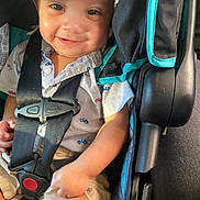 Kaneki is registered to the contest to win money with this photo: baby, child, car_seat, hat, smile, happy, sitting, seatbelt, closeup, person, infant, clothing, cute, car_interior, young_child, portrait, safety, daylight, cute_expression, small_person