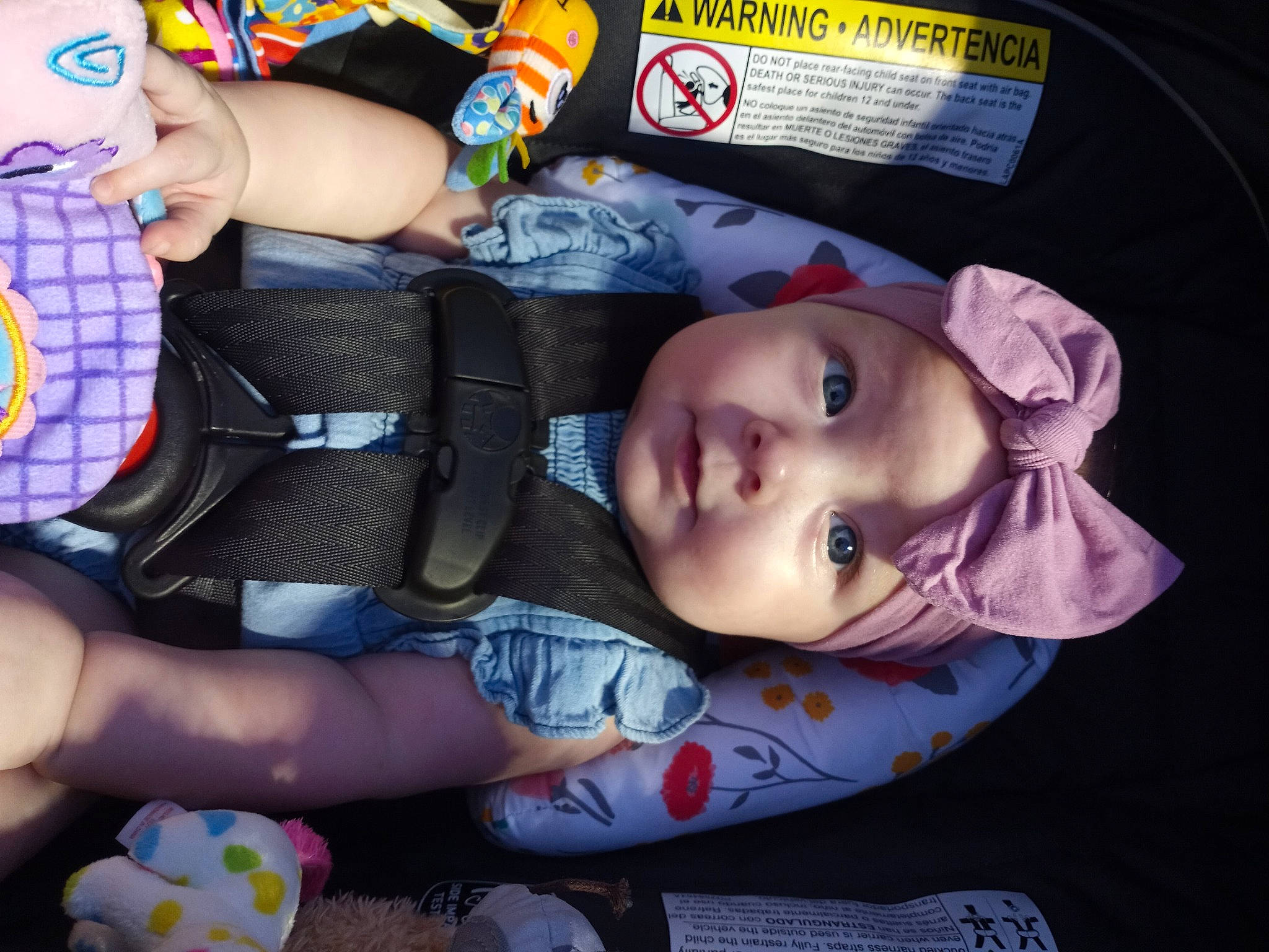 Blakely is registered to the contest to win money with this photo: baby, baby_products, baby_toddler_clothing, blue, cheek, child, eyelash, hat, headwear, human_leg, mouth, nail, pattern, person, plastic, thigh, toddler, toy