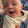 Brayden joined the competition — help win amazing prizes! baby, infant, smile, laugh, close_up, white_shirt, nike, hand, person, indoor, water_bottle, background, blur, happy, face, child, young, cute, human, toddler
