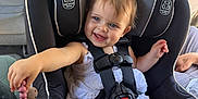 Zoe joined the competition — help win amazing prizes! baby, car_seat, child, smiling, pacifier, interior, car, seatbelt, safety, happy, infant, clothing, cute, person, seat, toy, transportation, leisure, young_child, automobile