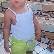 Thaïss is registered to the contest to win money with this photo: casual_clothing, child, closeup, curious, curly_hair, daylight, innocent, lime_shorts, mosaic_floor, mosaic_stairs, outdoor, person, pigtails, portrait, sandals, standing, tile_pattern, toddler, white_tank_top, young_child