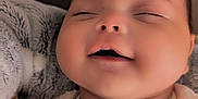 Aria participe au concours pour gagner de l'argent avec cette photo : baby, infant, sleeping, blanket, soft, face, hand, cute, child, cozy, clothing, newborn, peaceful, portrait, skin, indoors, comfort, rest, expression, head