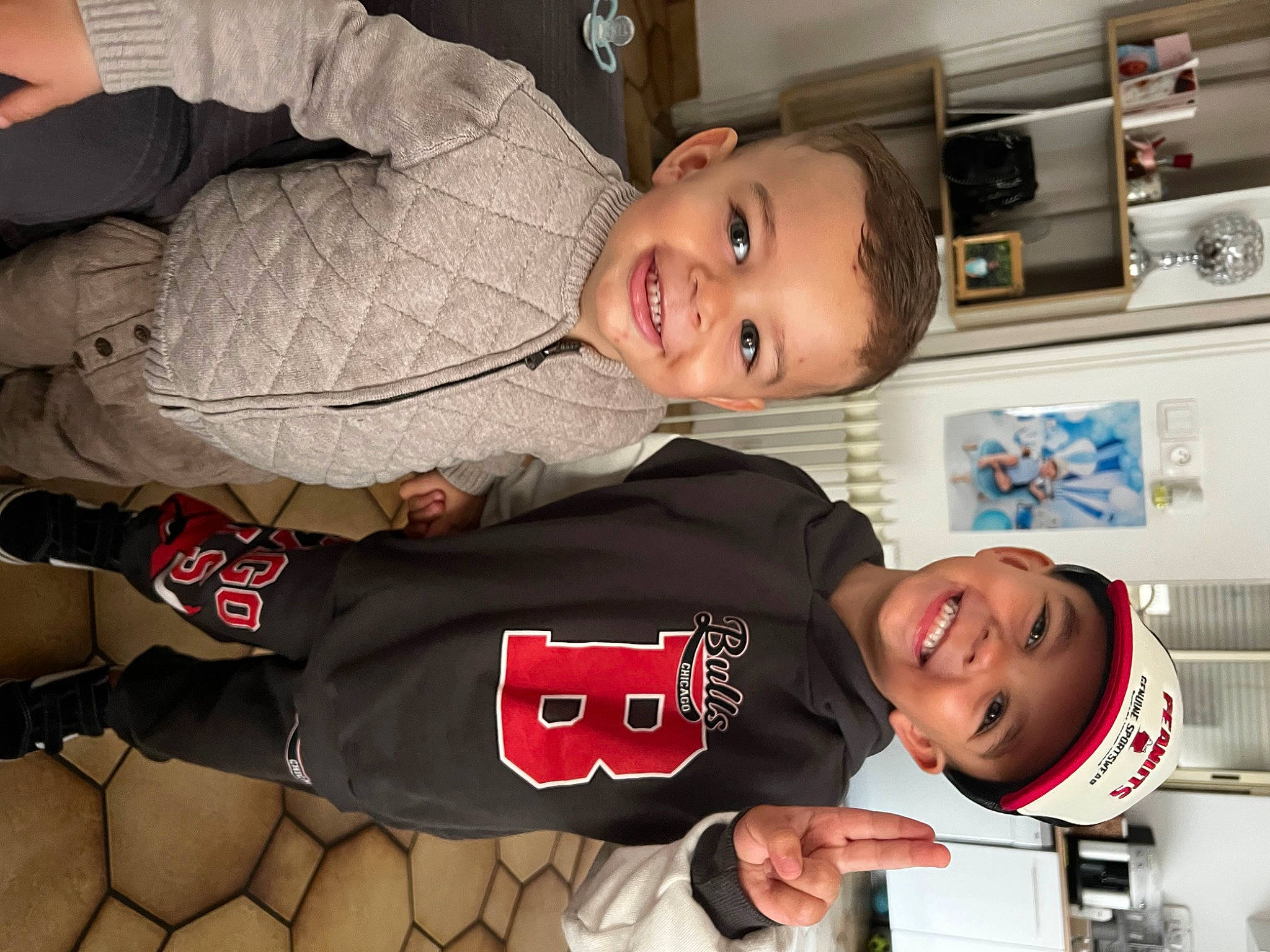 Brayton participe au concours pour gagner de l'argent avec cette photo : baby, baby_toddler_clothing, cabinetry, carmine, child, comfort, facial_expression, fun, happy, headwear, home_appliance, joy, kitchen_appliance, microwave_oven, organ, person, room, sleeve, smile, sportswear