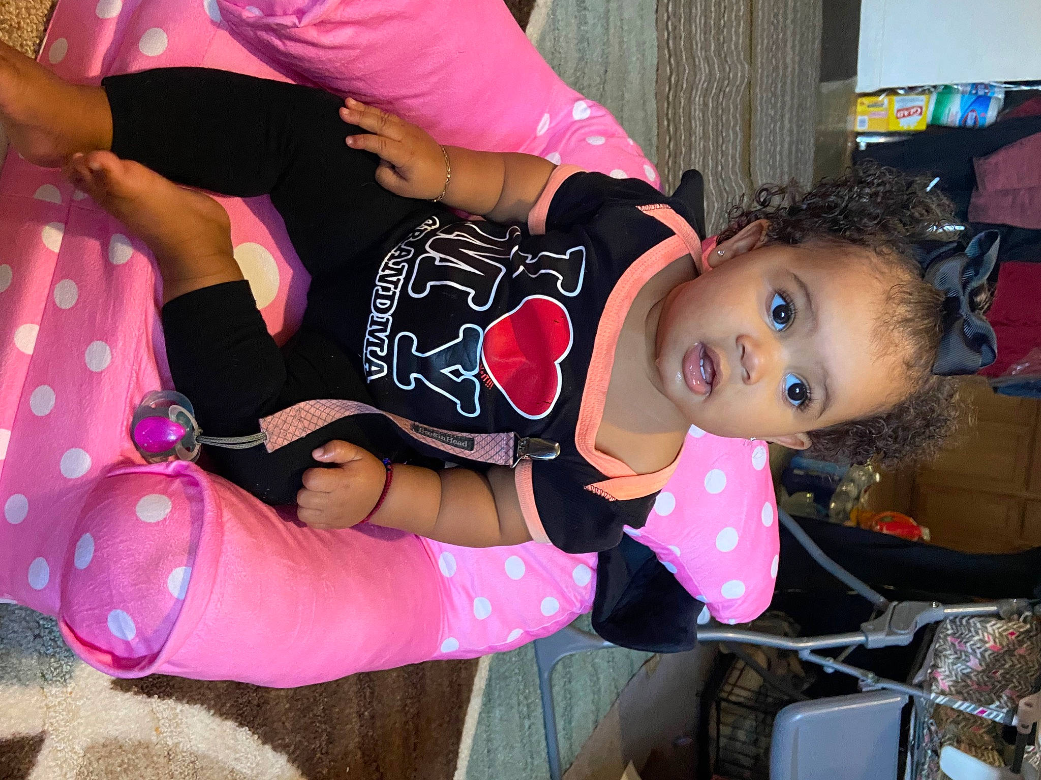Mariah is registered to the contest to win money with this photo: bag, black_hair, child, cool, costume, fashion, fun, happy, human_leg, luggage_and_bags, magenta, pattern, person, pink, product, sleeve, surprise, textile, thigh, toddler