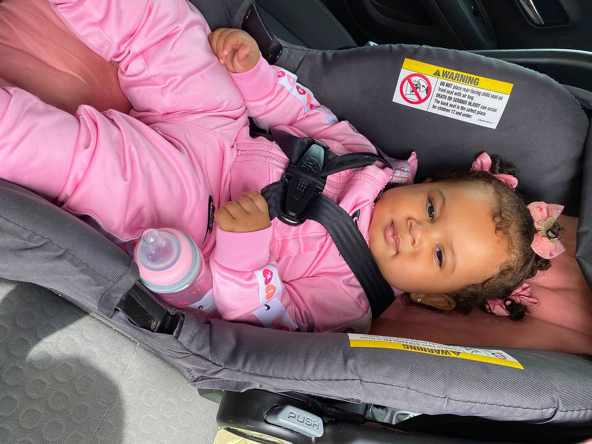 Mariah joined the competition — help win amazing prizes! auto_part, automotive_design, automotive_exterior, baby, baby_carriage, baby_in_car_seat, baby_products, baby_toddler_clothing, car_seat, car_seat_cover, child, comfort, family_car, lap, luxury_vehicle, motor_vehicle, person, pink, sitting, toddler