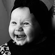 Anastasia a rejoint le concours — aidez-le/la à gagner de superbes lots ! baby, smiling, black_and_white, portrait, headband, bow, leopard_print, clothing, chubby_cheeks, cute, child, happy, face, infant, closeup, expression, person, studio, monochrome, adorable