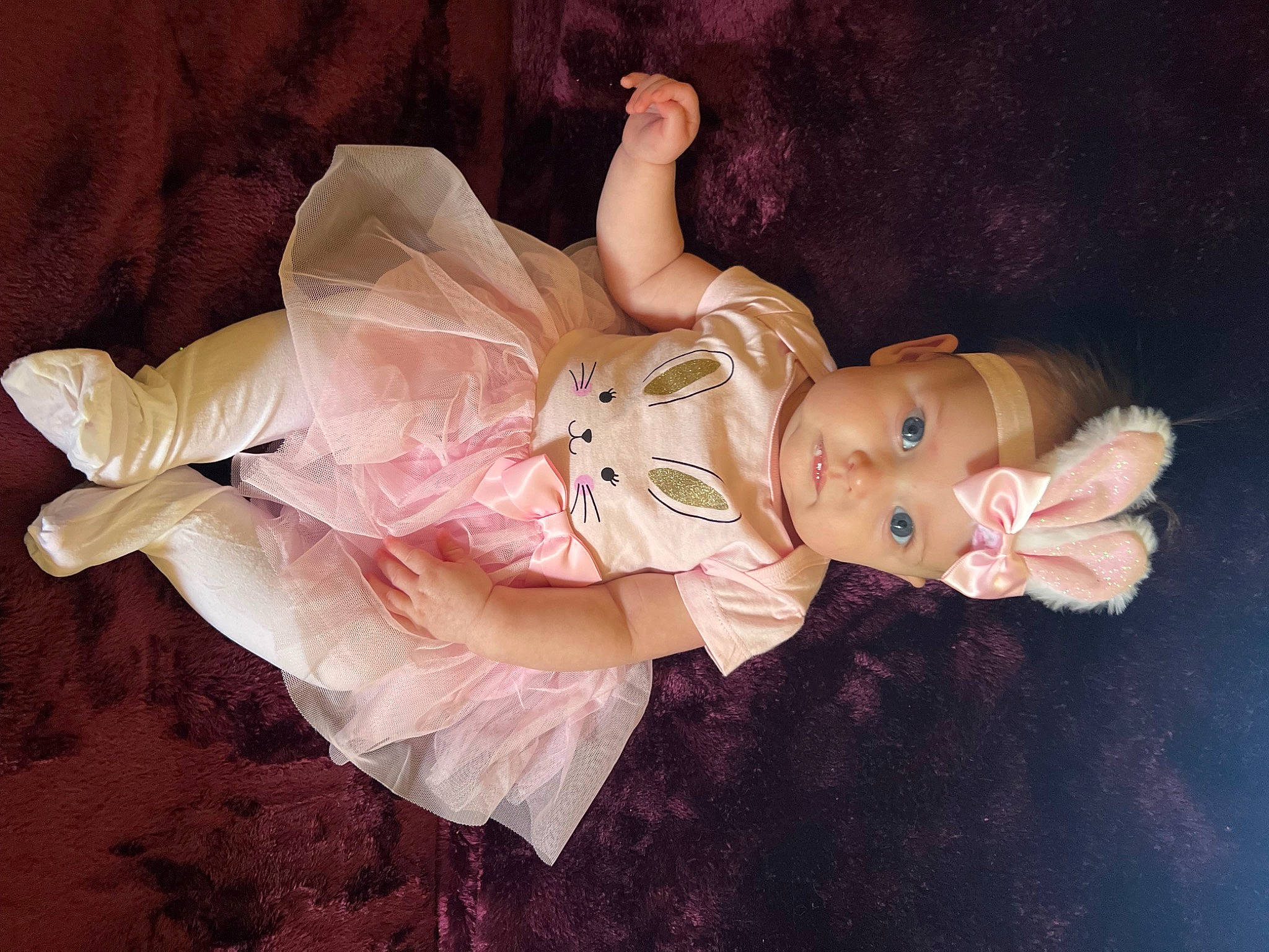 Felicity is registered to the contest to win money with this photo: cheek, child, costume, doll, dress, figurine, flesh, fun, gesture, happy, head, headwear, peach, person, pink, sitting, toy, vintage_clothing, wood