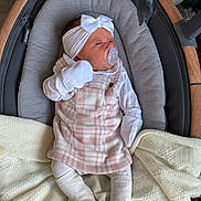 Freya joined the competition — help win amazing prizes! baby, newborn, pacifier, headband, bow, blanket, baby_carrier, clothing, white, pink, sleeping, infant, cute, soft, cozy, resting, indoors, portrait, child, person