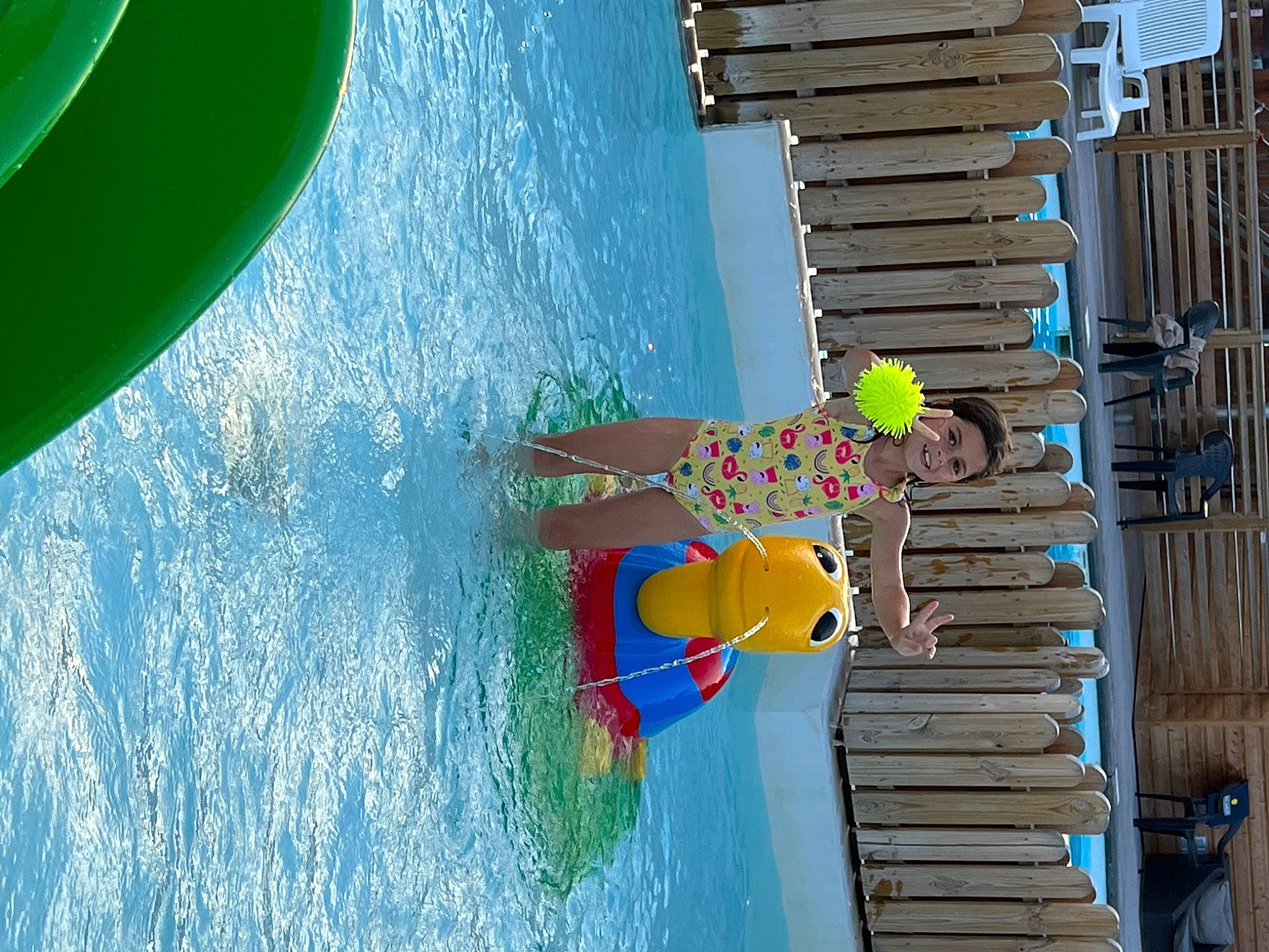 Lola a rejoint le concours — aidez-le/la à gagner de superbes lots ! aqua, azure, bathing, child, chute, electric_blue, fun, joy, leisure, ocean, person, play, recreation, swimming_pool, toddler, vacation, visual_arts, water, wave, wind_wave