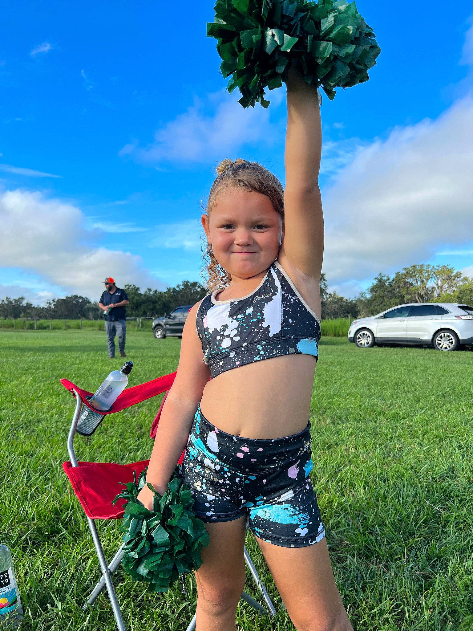 Arailea is registered to the contest to win money with this photo: blue, car, cloud, electric_blue, grass, grassland, green, happy, joy, leisure, people_in_nature, person, plant, shorts, sky, summer, swimwear, thigh, tree, trunk
