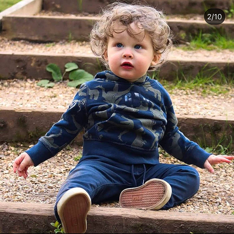 Ash joined the competition — help win amazing prizes! baby, baby_toddler_clothing, child, dress, eye, face, grass, happy, head, human, leaf, leisure, pattern, people_in_nature, person, plant, sitting, sleeve, summer, toddler