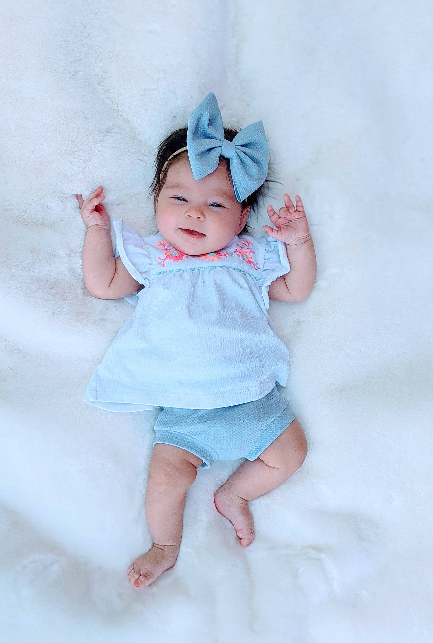 Oaklea is registered to the contest to win money with this photo: baby, baby_toddler_clothing, child, day_dress, face, finger, foot, fun, happy, headwear, magenta, pattern, person, pink, portrait_photography, sitting, skin, sleeve, sun_hat, toddler