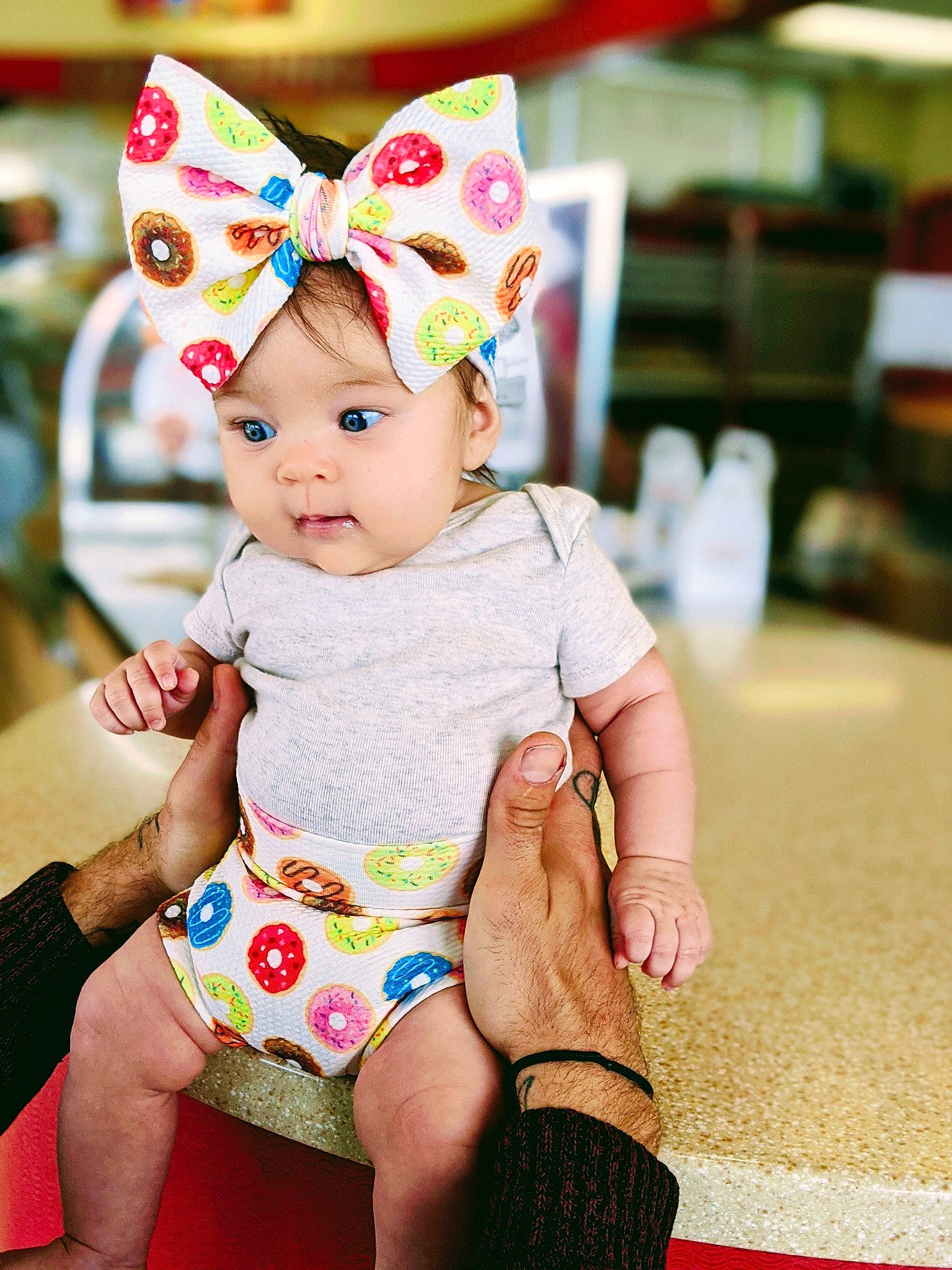 Oaklea is registered to the contest to win money with this photo: baby, baby_toddler_clothing, cap, clothing, costume_hat, crown, event, eye, face, fun, happy, hat, headwear, human_body, party_hat, person, pink, skin, sleeve, toddler