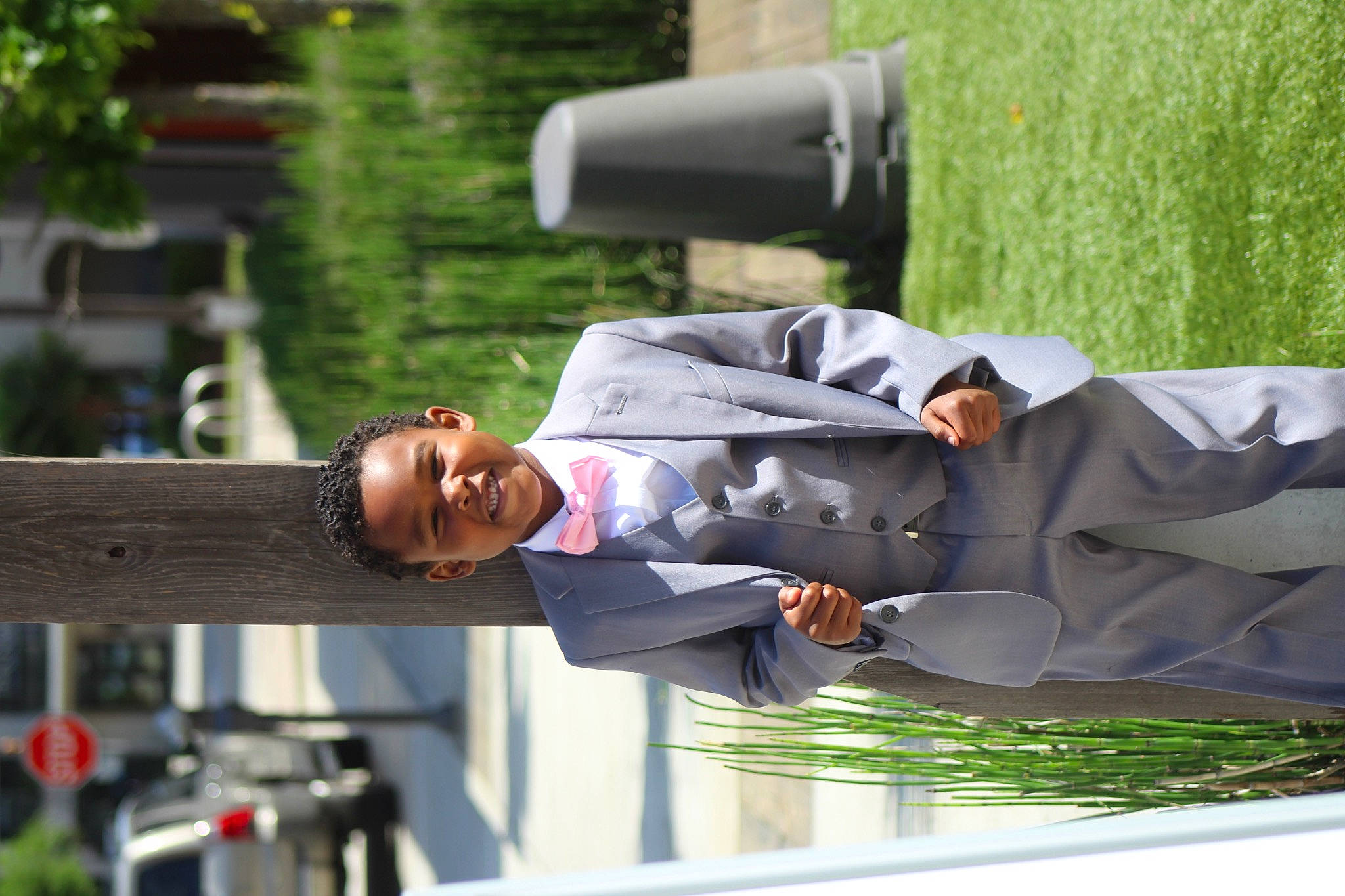 Benjamin J Landry joined the competition — help win amazing prizes! automotive_exterior, formal_wear, gesture, grass, hat, joy, leisure, person, plant, suit, tie, tree, uniform, white_collar_worker