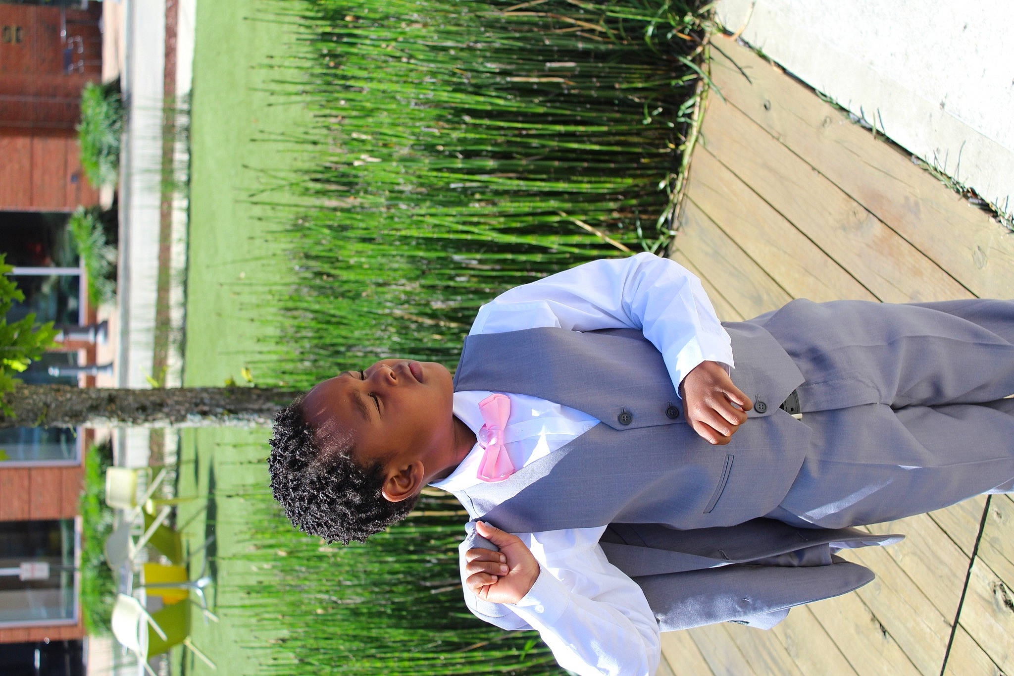 Benjamin J Landry is registered to the contest to win money with this photo: garden, grass, green, hat, leisure, person, plant, water, wood