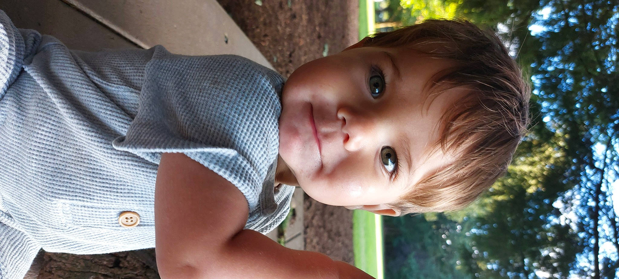 Gary is registered to the contest to win money with this photo: cheek, chin, dress, eye, eyebrow, eyelash, flash_photography, happy, head, iris, lip, mammal, mouth, nose, person, plant, skin, smile, tree, vertebrate