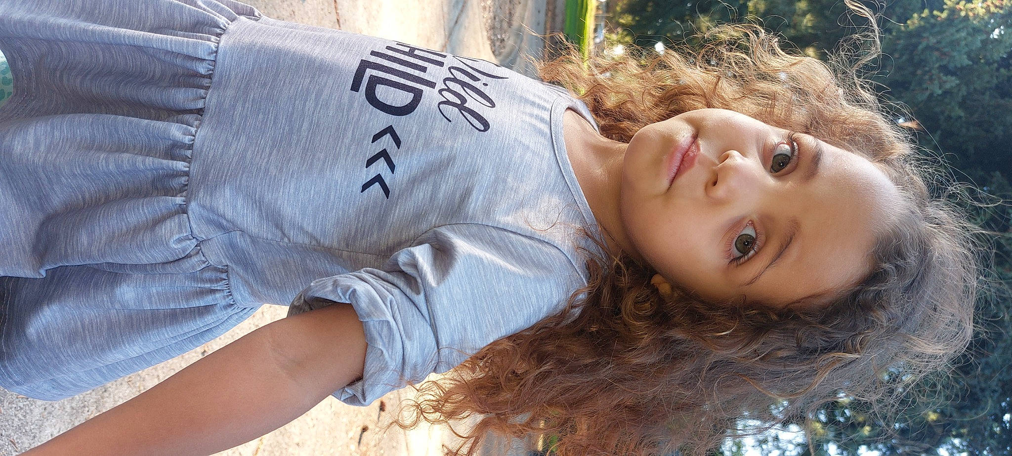 Lyric joined the competition — help win amazing prizes! black_hair, brown_hair, cool, eye, eyelash, eyewear, face, flash_photography, grass, happy, human_leg, leisure, lip, long_hair, pattern, people_in_nature, person, plant, skin, t_shirt