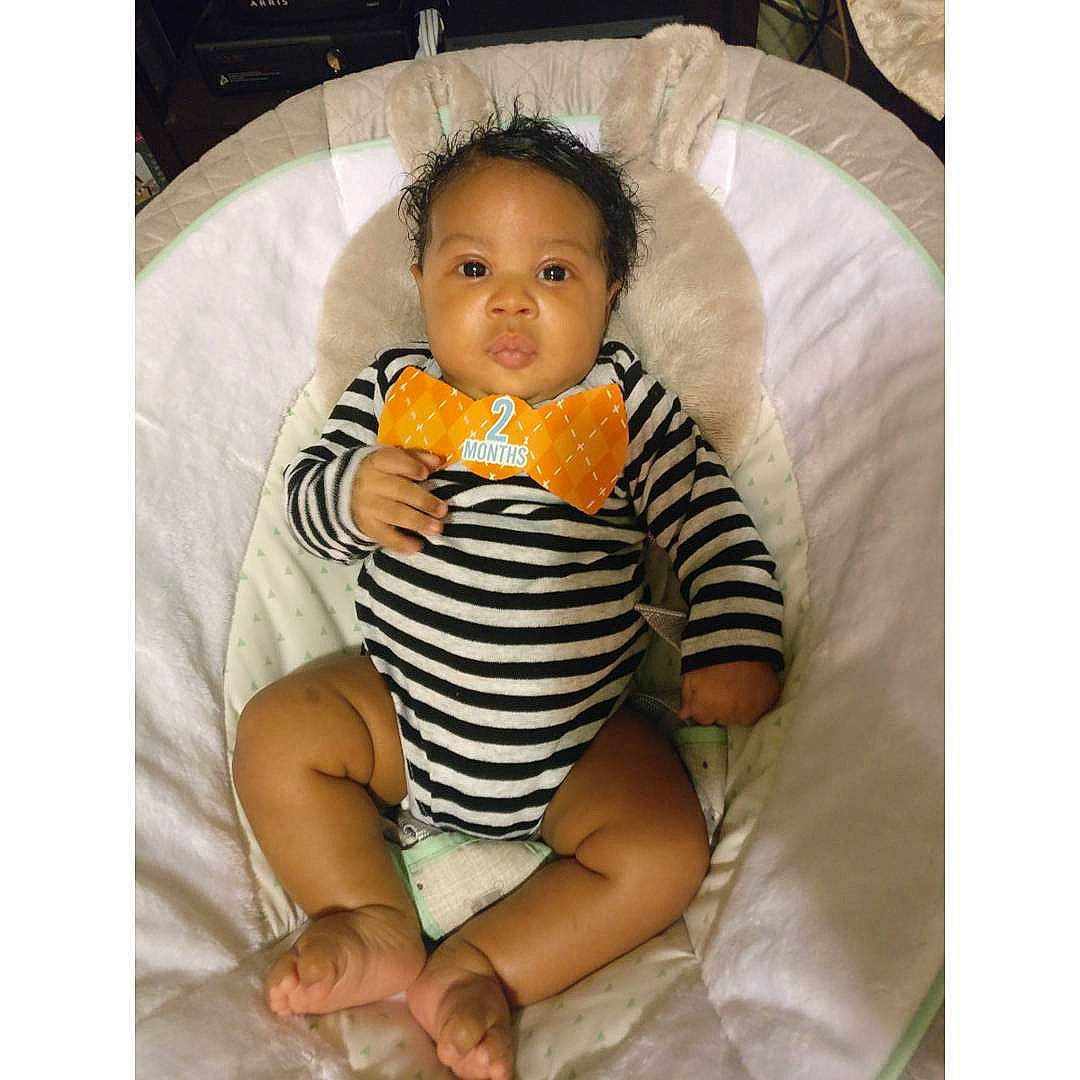 Christopher is registered to the contest to win money with this photo: abdomen, arm, baby_products, child, infant, person, product, sitting, smile, textile, toddler