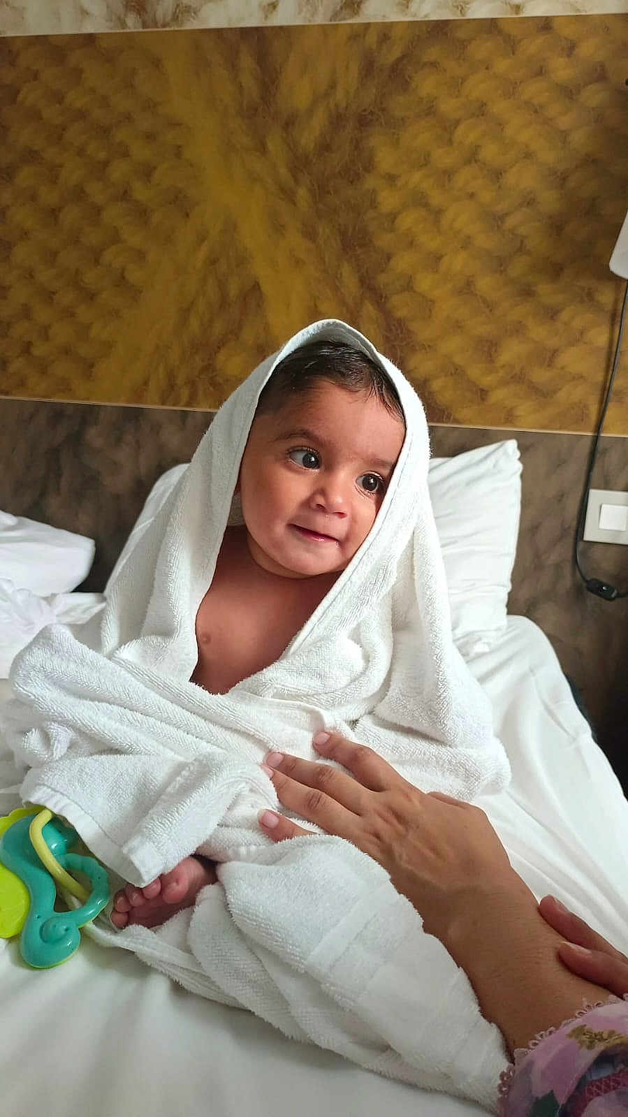 Arsal is registered to the contest to win money with this photo: baby, bed, bedroom, care, child, comfort, cute, hand, indoor, infant, person, portrait, skin, smile, soft, texture, towel, warm, white_towel, wrapped