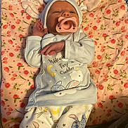 Mia joined the competition — help win amazing prizes! adult_hands, baby, bed, blanket, clothing, cozy, cute, floral_blanket, hat, indoor, infant, newborn, nursery, onesie, pacifier, pajamas, portrait, sleeping, space_theme, stuffed_character
