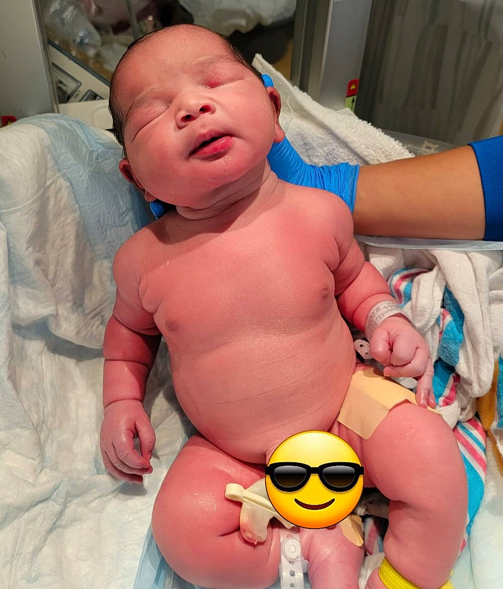 Ian is registered to the contest to win money with this photo: arm, baby, baby_playing_with_toys, cheek, chest, eye, facial_expression, finger, hand, head, human_body, leg, mouth, muscle, nose, organ, person, product, skin, stomach