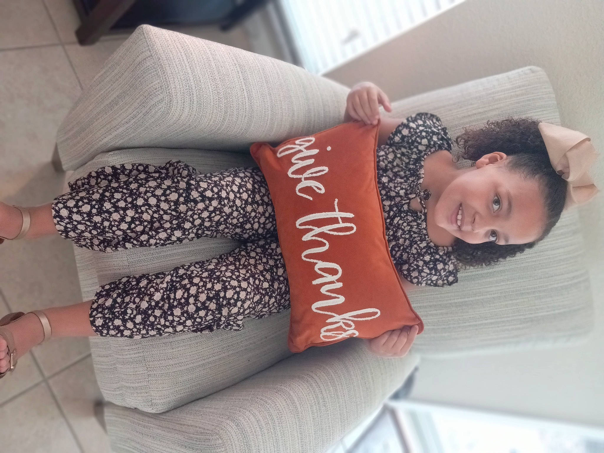 Passion is registered to the contest to win money with this photo: comfort, couch, elbow, finger, font, gesture, happy, human_leg, joint, joy, linens, material_property, nail, pattern, person, pink, product, sleeve, smile, textile