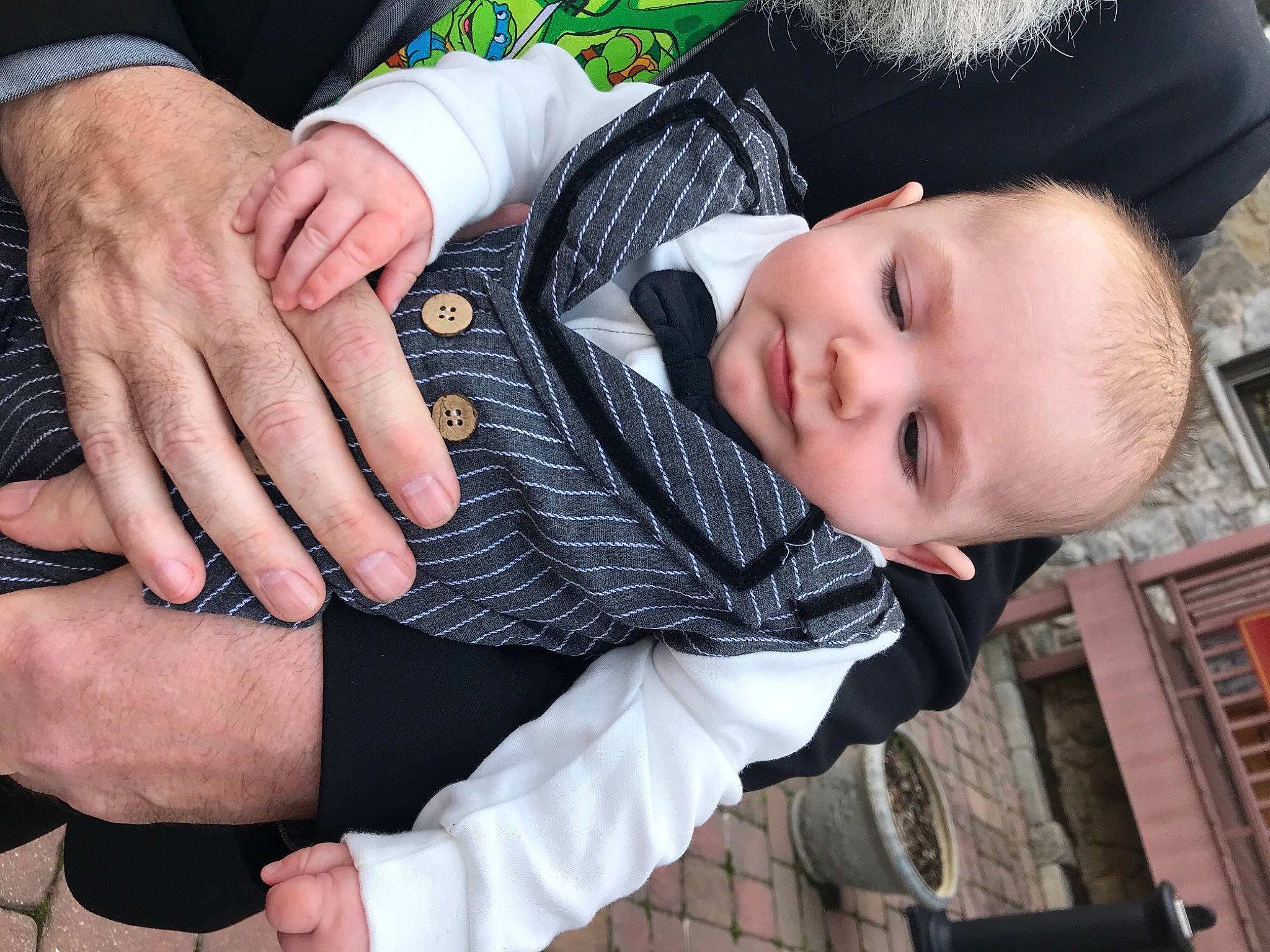 Edgar is registered to the contest to win money with this photo: baby, baby_toddler_clothing, cheek, child, finger, gesture, grass, hand, happy, hat, holding_hands, nail, pattern, person, skin, sleeve, thumb, toddler, tree, wood