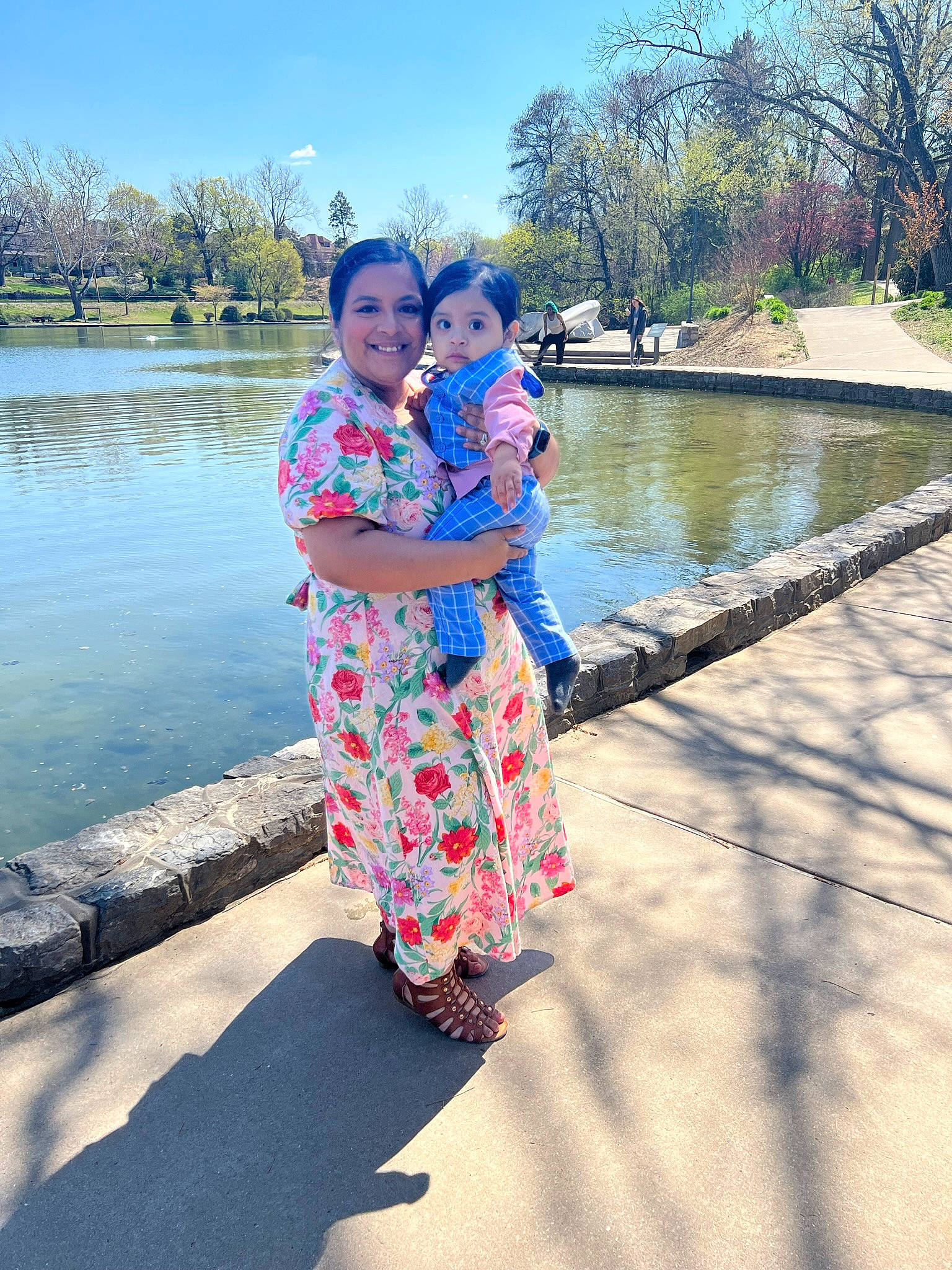 Christian is registered to the contest to win money with this photo: baby, bank, child, event, fun, gesture, happy, joy, lake, leisure, people_in_nature, person, plant, recreation, sky, standing, summer, toddler, tourism, travel