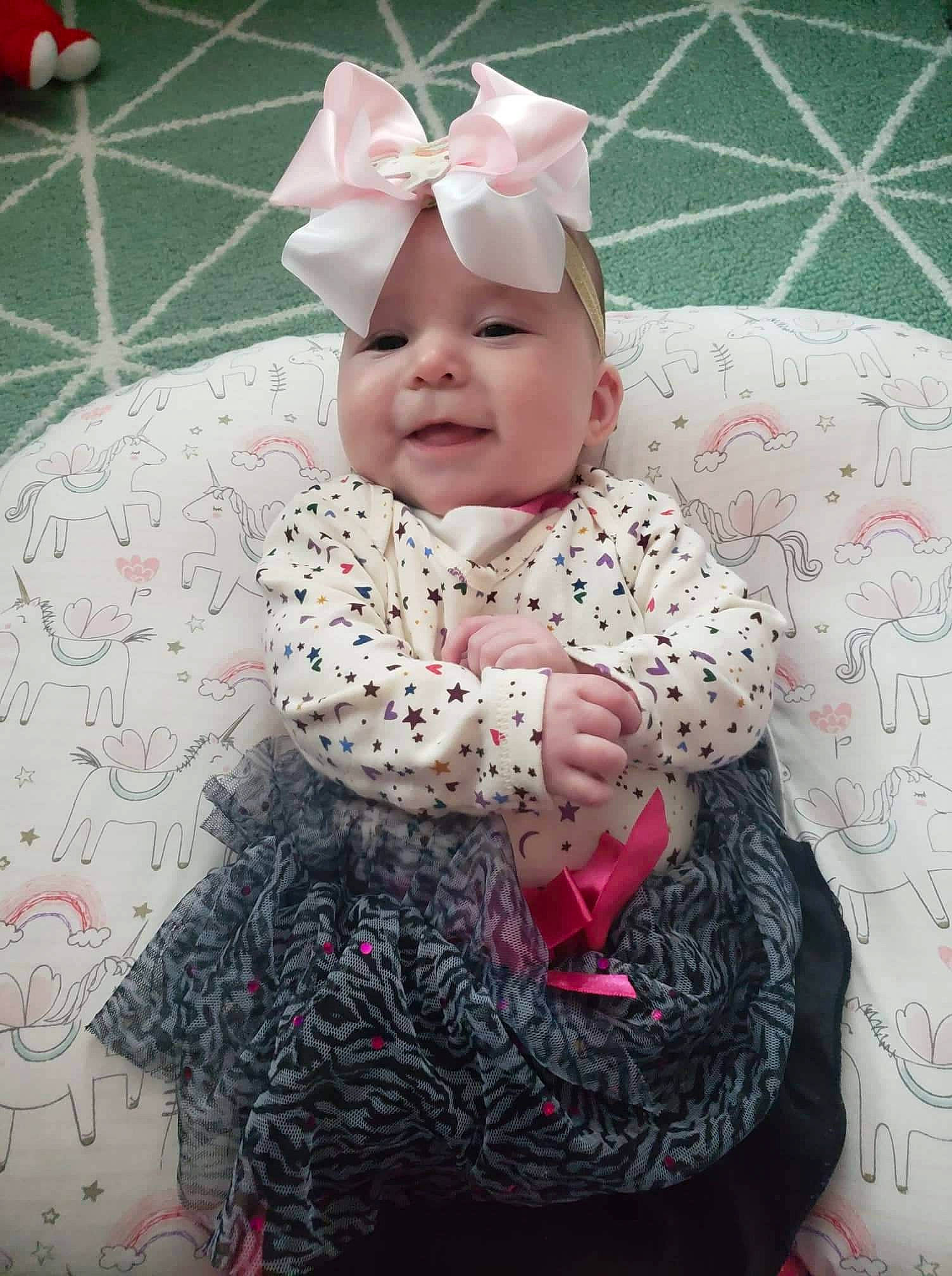 Alexandria joined the competition — help win amazing prizes! baby, baby_products, baby_toddler_clothing, carmine, cheek, child, comfort, costume, event, face, fashion_accessory, flooring, hair_accessory, happy, headpiece, headwear, pattern, person, pink, sleeve