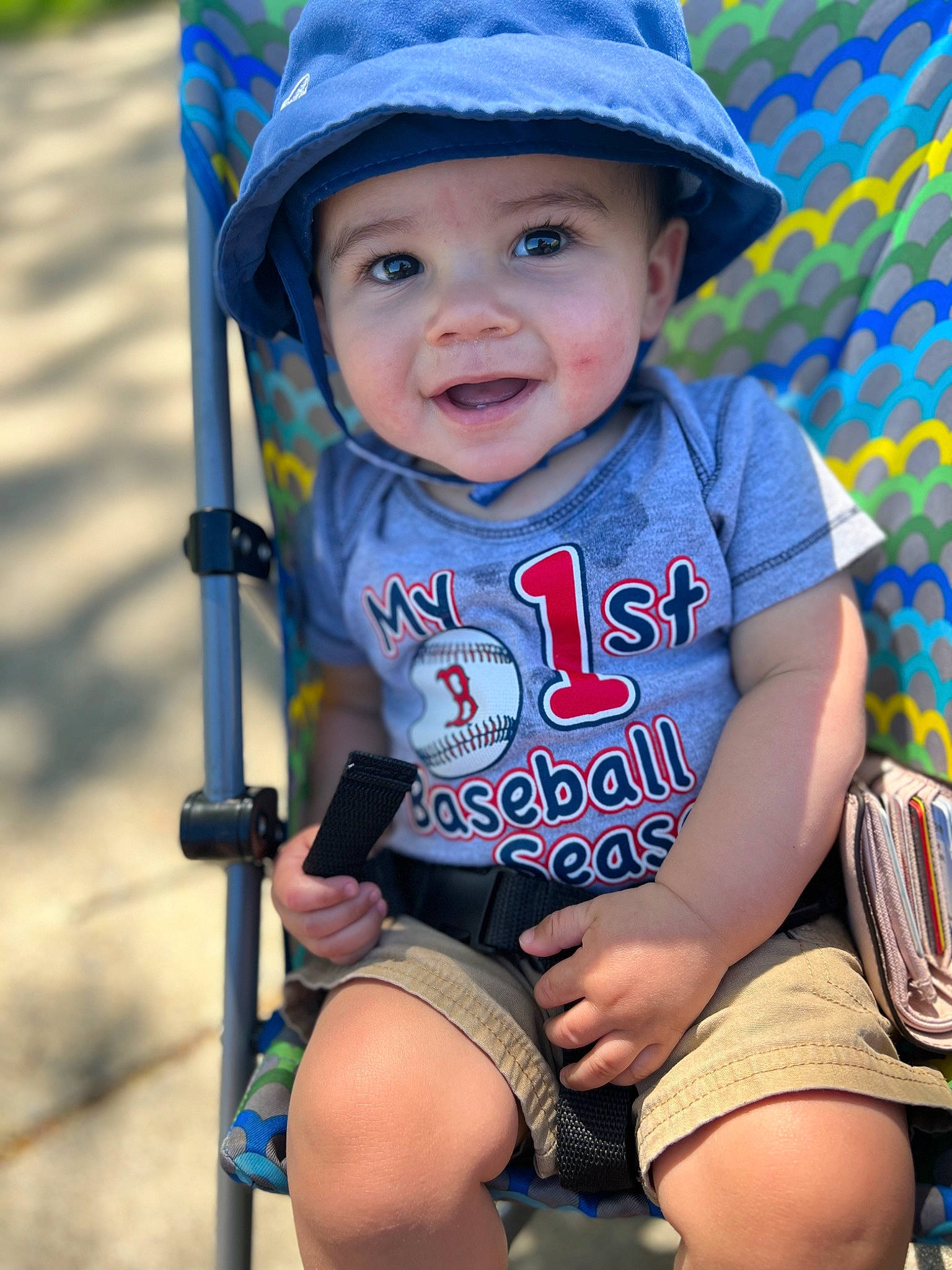 Greysen joined the competition — help win amazing prizes! baby_toddler_clothing, blue, chin, clothing, cool, eye, face, facial_expression, grass, green, happy, headgear, headwear, joy, leisure, people_in_nature, person, photograph, product, skin