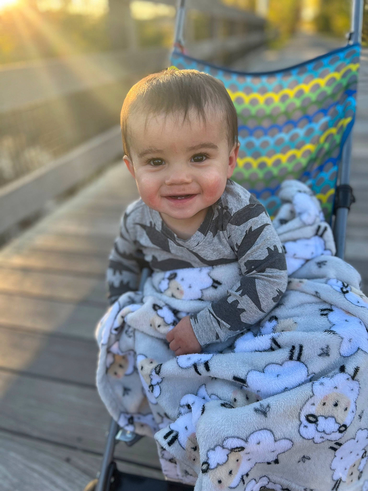 Greysen joined the competition — help win amazing prizes! baby, baby_toddler_clothing, child, eye, face, facial_expression, fun, grass, hairstyle, happy, head, joy, leaf, leisure, person, sitting, skin, sleeve, smile, toddler