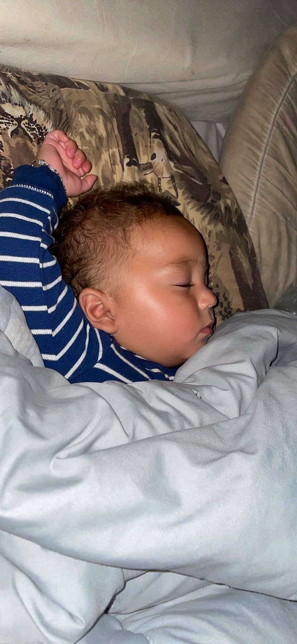 Miguel is registered to the contest to win money with this photo: baby, baby_sleeping, baby_toddler_clothing, bedtime, cheek, child, comfort, ear, eyelash, forehead, gesture, linens, mouth, nap, nose, person, room, sitting, skin, sleep